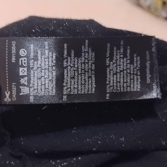 Sheer sparkle top with keyhole bow tie back and sheer panel neck and hem - Picture 7 of 8